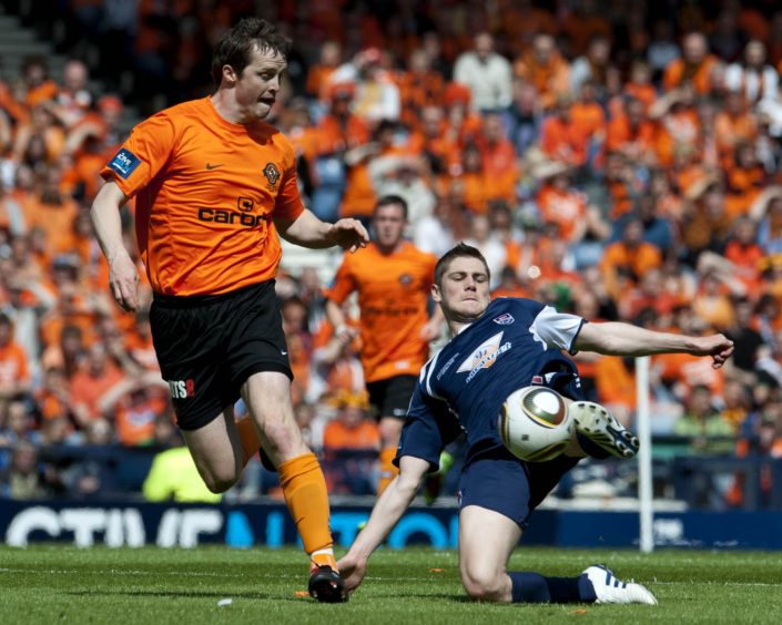 Jon Daly closes down Iain Vigurs.