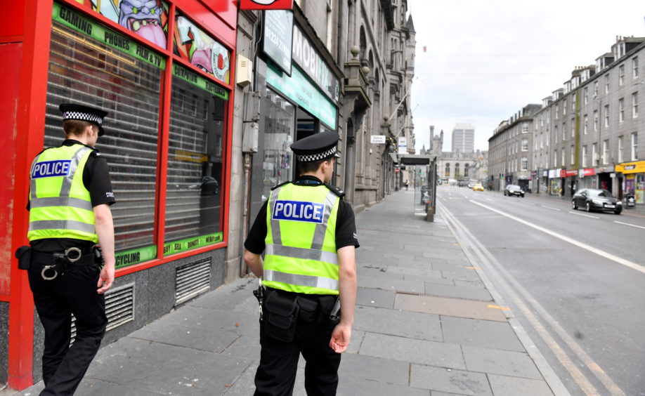 PC Andy Mackenzie and PC Ian Paterson police the city streets of Aberdeen.    
Picture by Kami Thomson
