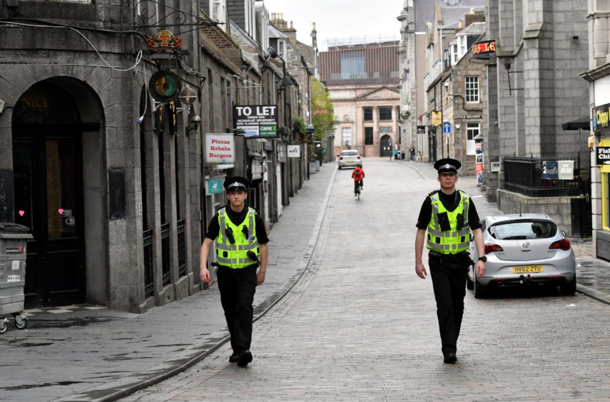 PC Ian Paterson and PC Andy Mackenzie on Belmont Street.    
Picture by Kami Thomson