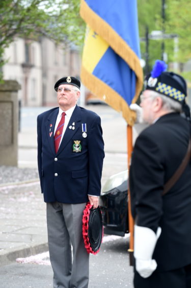 Beauly and District Royal British Legion Scotland (RBLS) yesterday held a very short service of remembrance on the 75th anniversary of VE Day in 1945. Picture by Sandy McCook