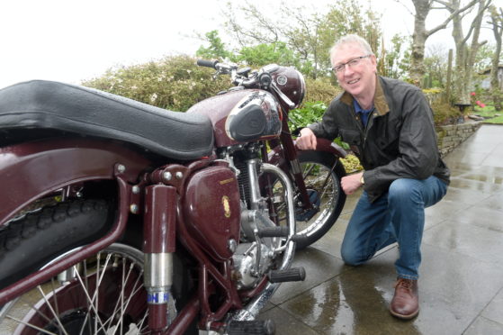 Michael Wade with his restored 1955 BSA former Police motorbike.
Picture by Sandy McCook.