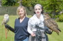 Jane Wilson and Hadassah Broscova-Righletti of the Blue Highlands Bird of Prey Rescue Centre in Brora with 'Bella' the barn owl and 'Cherlock' a Eurasian Eagle Owl.
Picture by Sandy McCook.