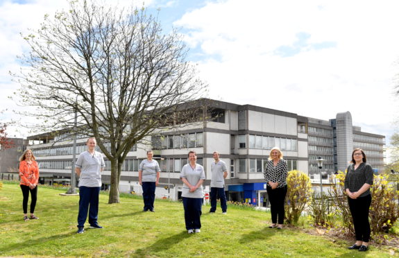 RGU's Heather Bain, nurses Michael Solo, Emma Burke, Fiona Buchan and Rory McCulloch with NHS Grampian chief nurse Jane Ewen and lead practice educator Joanne Grant. Picture by Kami Thomson