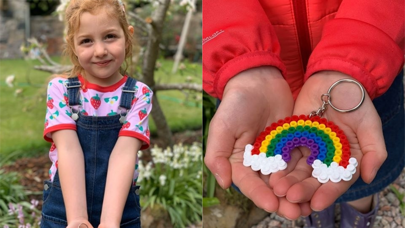 Helena Adams, 5,and one of the keychains she's crafted.