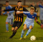 Liam MacDonald, left, in action for Huntly