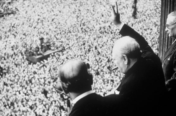 Mandatory Credit: Photo by Shutterstock (159999a)
WINSTON CHURCHILL
WINSTON CHURCHILL WAVING TO CROWD ON VE DAY - 08 MAY 1945