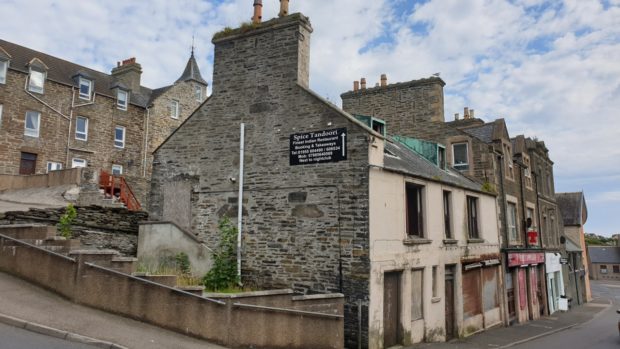 126 High Street, Wick will be one of two buildings demolished as part of the town's regeneration project.