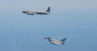 A Russian surveillance plane is shadowed by an RAF Typhoon.