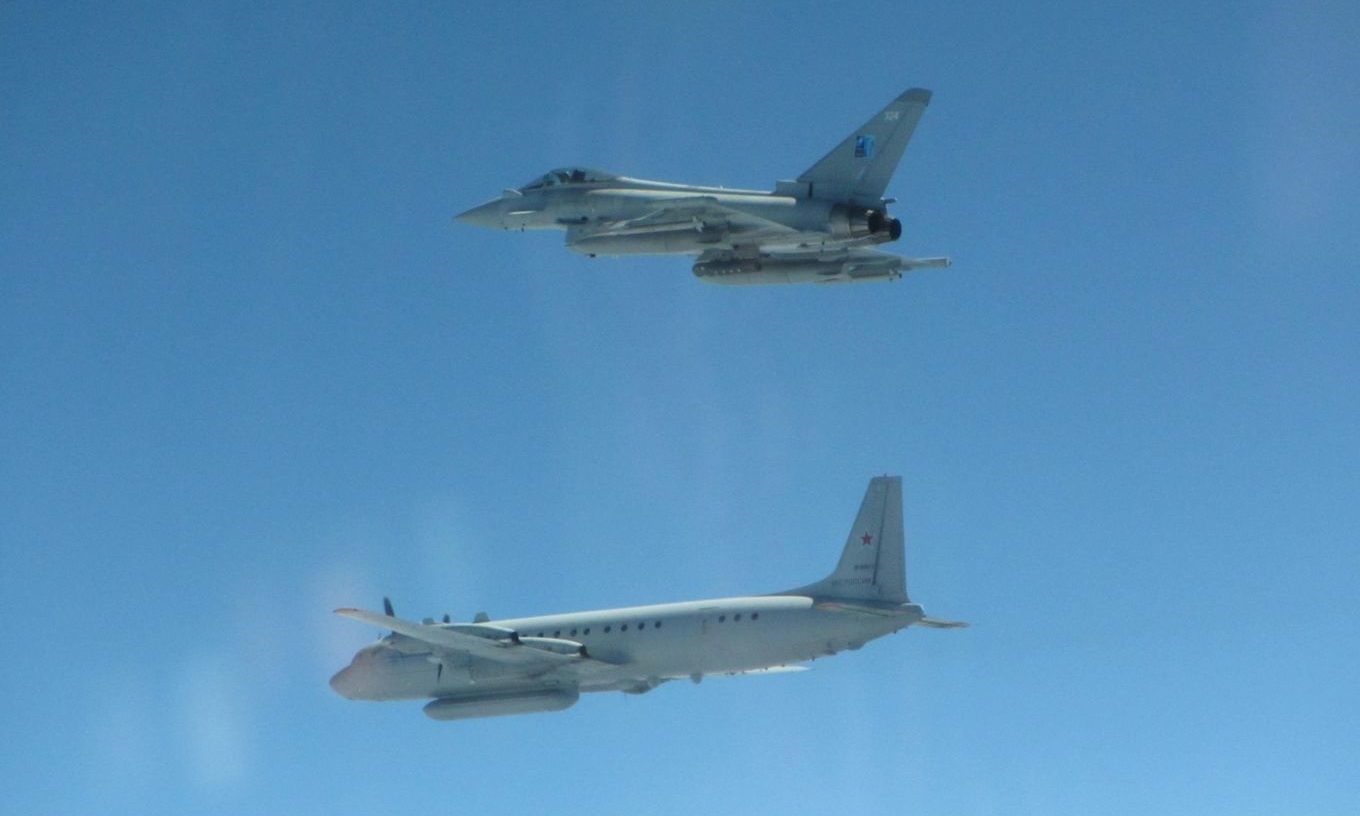 An RAF Typhoon and a Russian IL-20 COOT A after Typhoons were scrambled from Siauliai Air Base.
