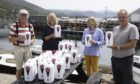 Welcome Ullapool have distributed 75 automatic hand sanitiser devices across the community.