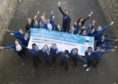 Councillor John Wheeler celebrating with Ferryhill School pupils on the occasion of their Unicef Rights Respecting School Gold Award last year.
