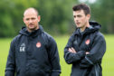 Aberdeen's Head of Medical & Football Science Adam Stokes (right)