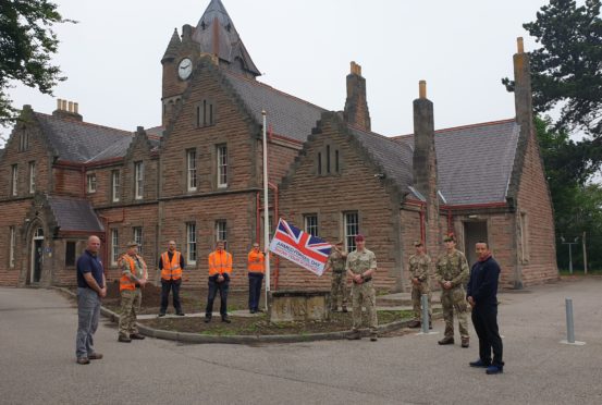 Armed Forces Day flag raised at Cameron Barracks in Inverness.