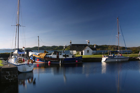 The Crinan Canal at Crinan Basin, looking on to the Sound of Jura, Argyll and Bute.