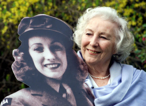 Dame Vera Lynn in the garden of the Savoy Hotel, after she was named personality of the century in a nationwide poll.