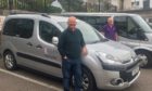 Volunteer drivers David Paterson and Martin Douglas are helping to take people to their appointments.