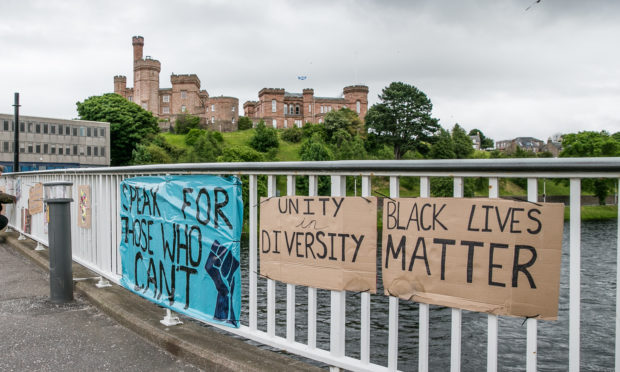 Signs and banners in support of Black Lives Matter on the Ness Bridge.