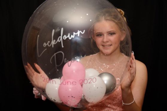 Libby Rhind from Buchanhaven Primary ready for the online prom.