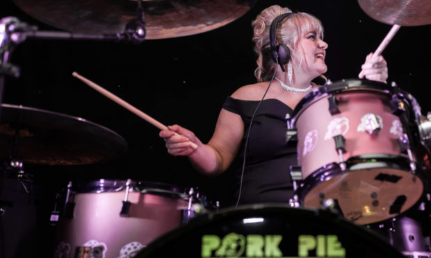 Mairi Newberry is the drummer for Glitz.