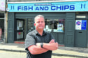 Graeme Herd, of Dolphin Fish And Chips, Chapel Street, has started a petition calling on Aberdeen City Council to "stop killing small businesses" with their physical distancing traffic measures. 
Picture by Kenny Elrick