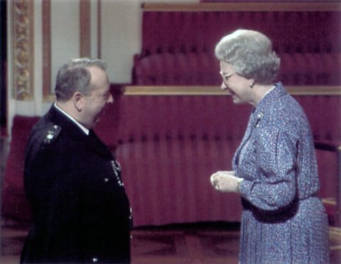 Special Cop Alan Melville with the Queen.