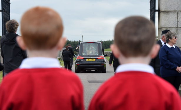 The Boys' Brigade members past and present formed a Guard of Honour from the gates at Kirkton Cemetery, Fraserburgh. Pictures by Kenny Elrick
