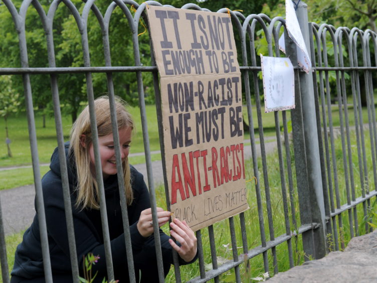 Black Lives Matter poster protest in Victoria Park. Picture by Kath Flannery