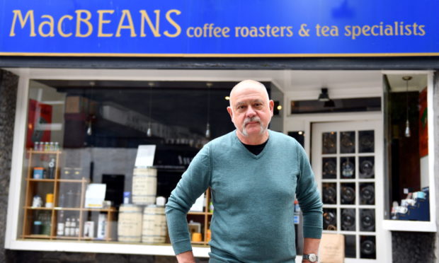 Ian Cukrowski of Macbeans on Little Belmont Street is among traders who have spoken of their disappointment at the potential continuation of physical distancing set up across the Granite City. 