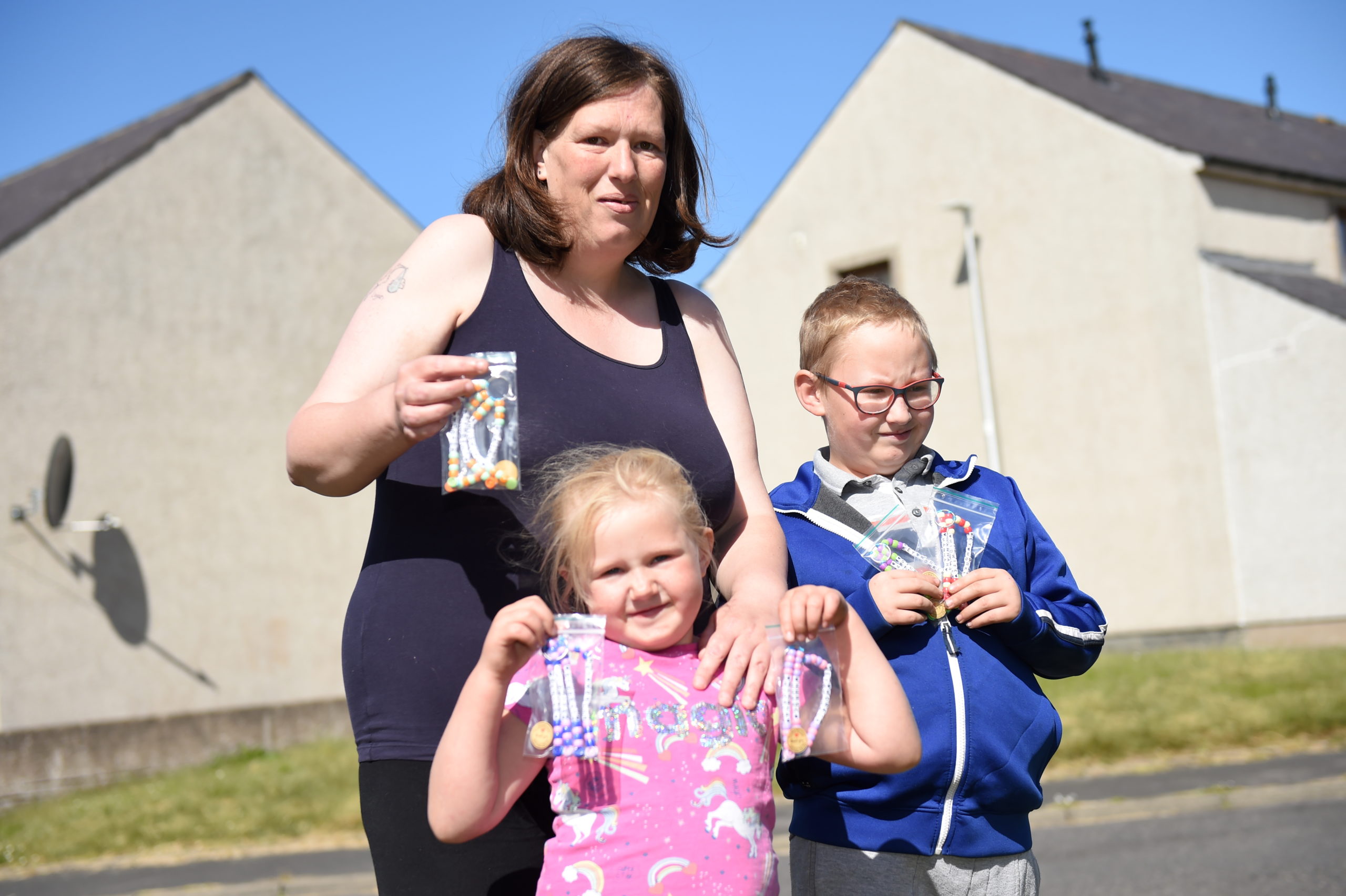 Nicola Mchattie and her children Logan (8) and Lana (5) have been making keyrings for key workers since the start of lockdown.