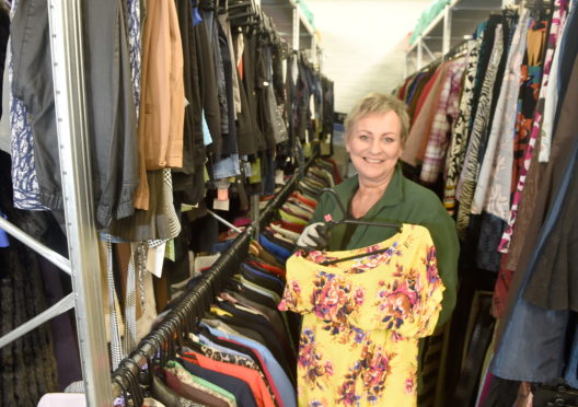 Manageress Sandra Wilkinson with some of the donations.
Picture by Sandy McCook