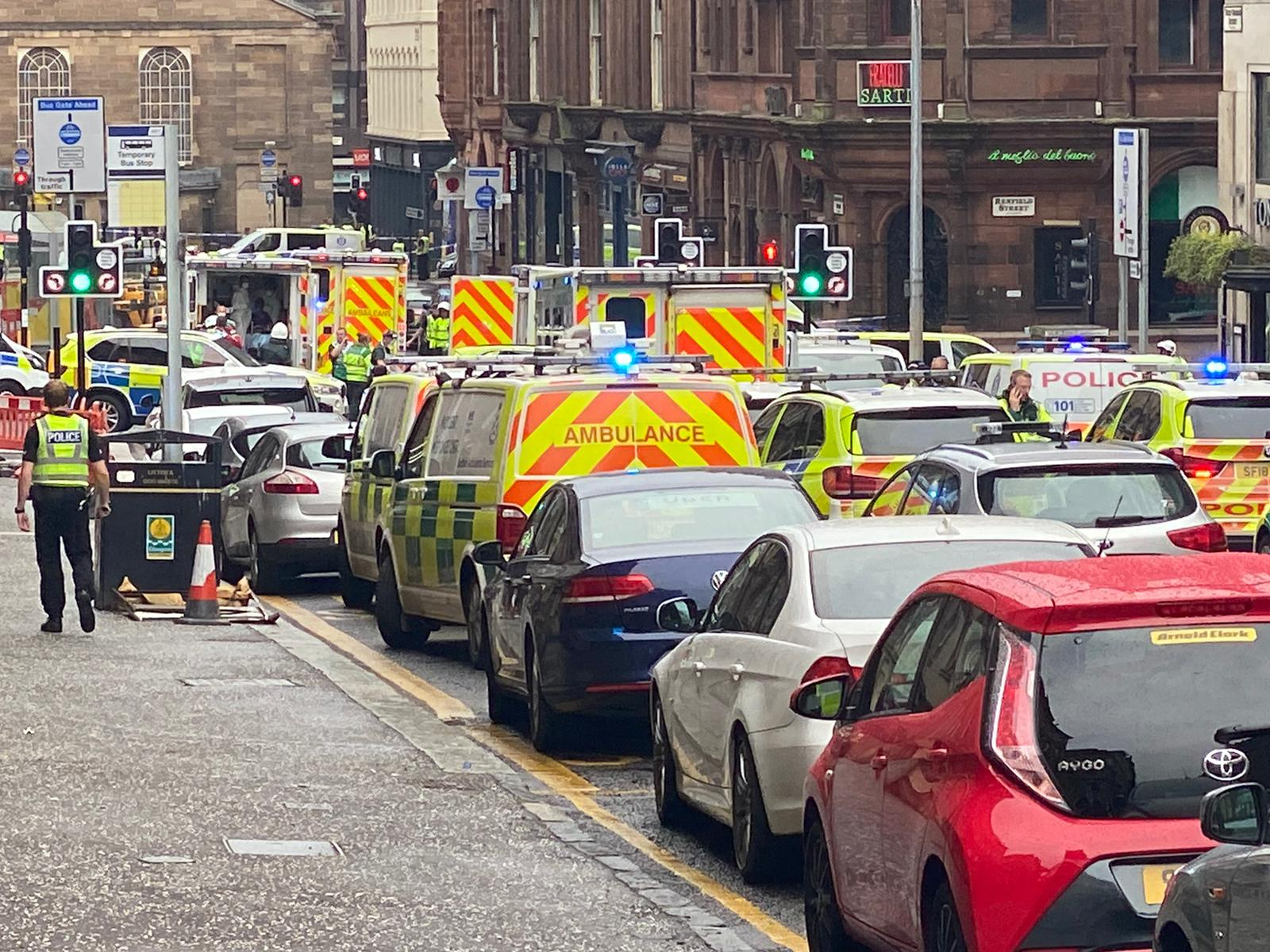 Police presence on West George Street following the incident.