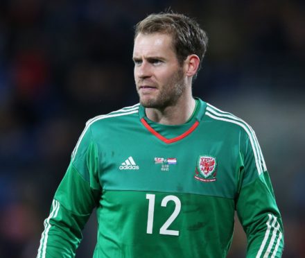 Owain Fon Williams in Wales colours.