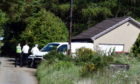 Police in Cuminestown following the death of Anthony McGladrigan. 
Picture by Jim Irvine