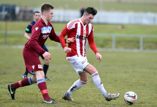 Hamish Ritchie (left) in action for Keith against Formartine United's Jamie Masson in 2016