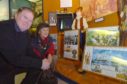 Heritge Centre chairman Ian Watson show the Charles Maclean exhibit to Jenny Hawke, from South Africa, on a previous visit.