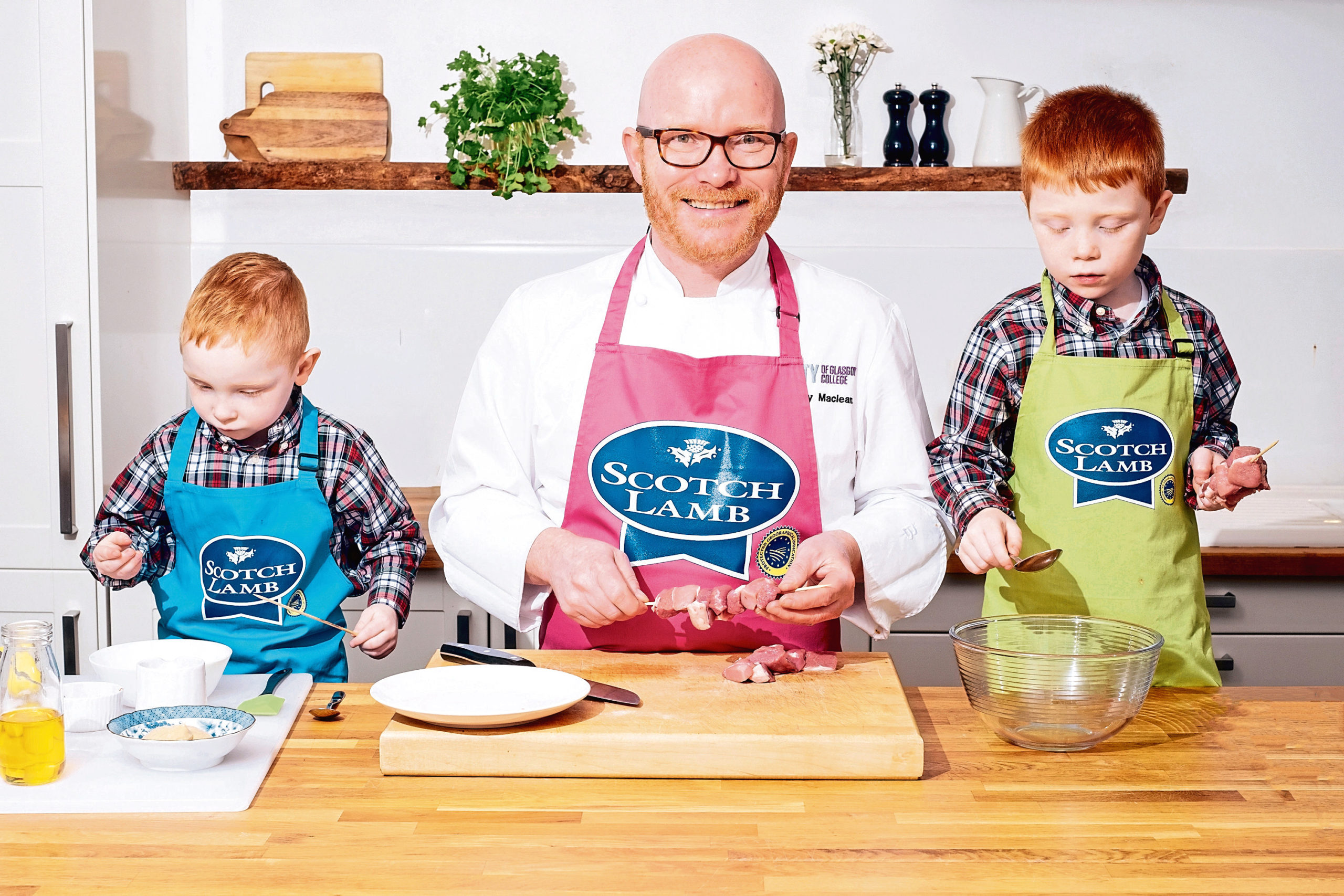 Leading Scottish chef Gary Maclean, pictured with his kids Harris and Finlay, is backing Quality Meat Scotland's Scotch Kitchen Classroom initiative.