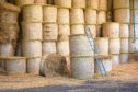 ladder and hay bales in storage; Shutterstock ID 430982734; Purchase Order: -

Farm ladder bales - health and safety picture