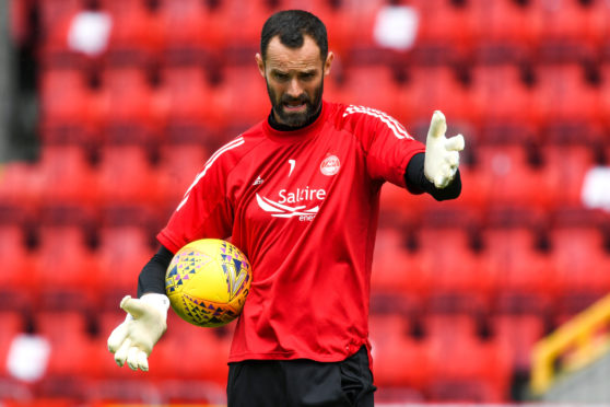 Aberdeen captain Joe Lewis.