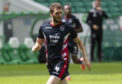 Alex Iacovitti in action for Ross County during a pre-season friendly match between Celtic and the Staggies.
