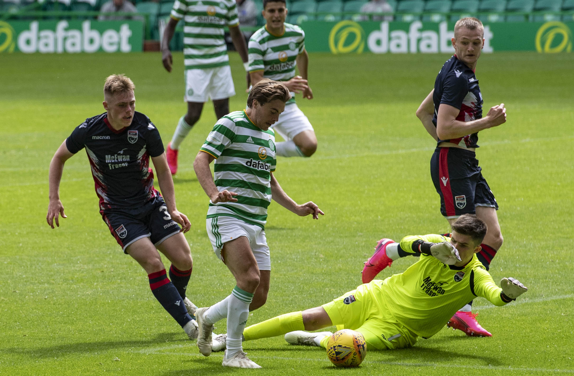 Celtic's James Forrest tries to go round trialist goalkeeper Ross Doohan during a pre-season friendly match between Celtic and Ross County at Celtic Park.