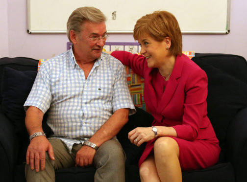 First Minister Nicola Sturgeon with Michael Brown, who successfully campaigned for a woman's "right to know" after his daughter was murdered by an ex-partner with a violent past.