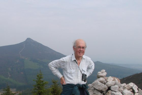 Dr John Hern, the former Medical Director at Aberdeen Royal Infirmary, hillwalking on Bennachie.