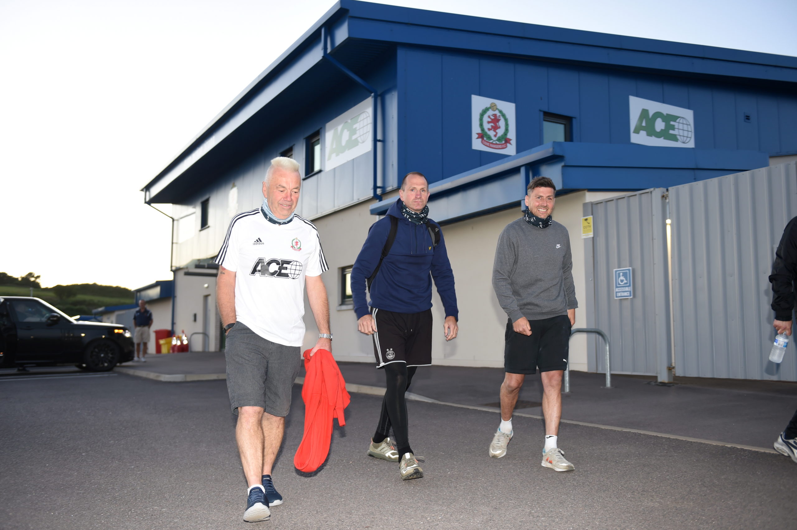 Ian Yule, Mark Perry and Roy McBain as they set off on their fundraising walk from the Balmoral Stadium to Tannadice.
Picture by Paul Glendell