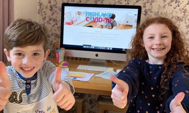 Ella-Mae-Hosie-8-and-Theo-Hosie-4-from-Inverness-enjoying-the-Kids-Zone-activities-on-the-Highland-Covid-19-website
