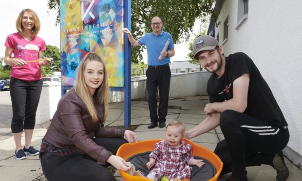 18-month-old Gracey Wemyss with her parents Shannon and Mickey, pictured with Little Fishes coordinator Morven Ball and Chris Dowling.