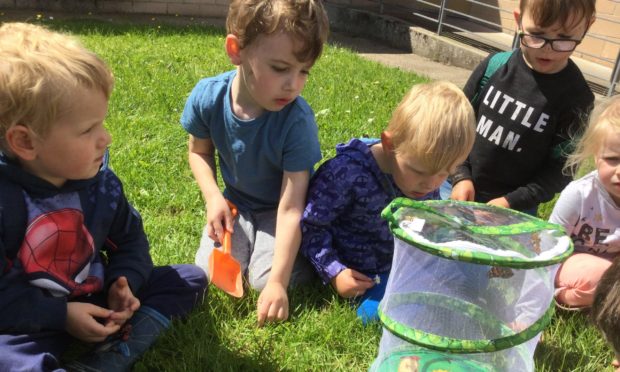 Outdoor play at Lhanbryde nursery outdoors.