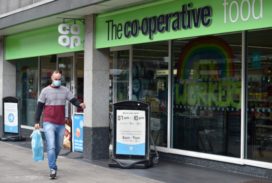 Shoppers in Scotland have to wear face masks in all shops from today as Coronavirus laws come into place.