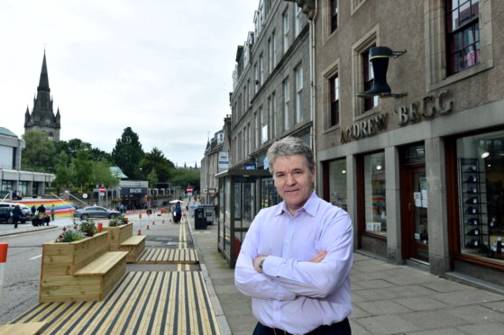 Andrew Begg of Andrew Begg Shoes, on Aberdeen's Upperkirkgate. 
Picture by Darrell Benns.