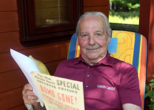 Navy veteran Ron Campbell pictured with his memorabilia and navy diary.  Picture: Kath Flannery