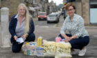 Karen Pryce-Iddon and Esther Green with care packages.
Picture by Kath Flannery.